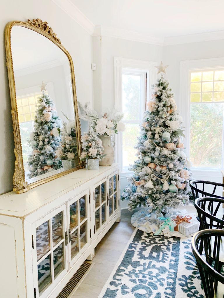 holiday decorating, white christmas, pink christmas, boho, christmas tree, holiday decor, pink holiday decor, mint holiday decor, gold mirror, flocked tree, boho decor